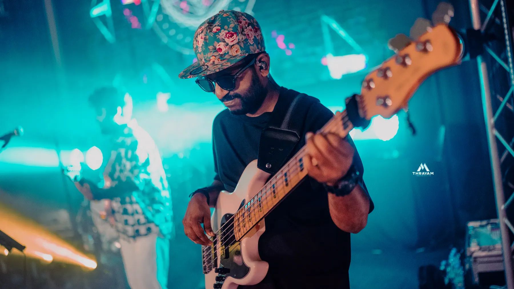 Urumi band performance with festival lighting